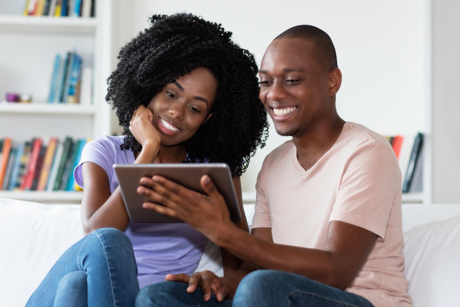 Couple watching movie on tablet computer