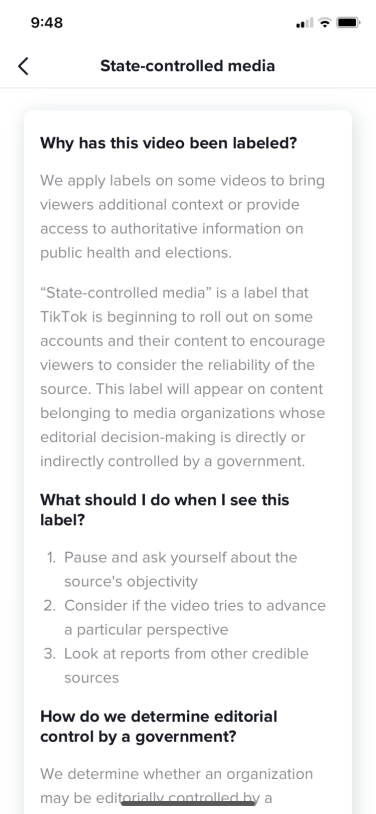 A screenshot of TikTok shows an information portal for state-controlled media.