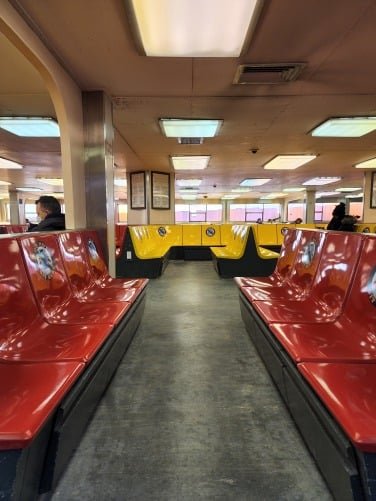 People riding a ferry.