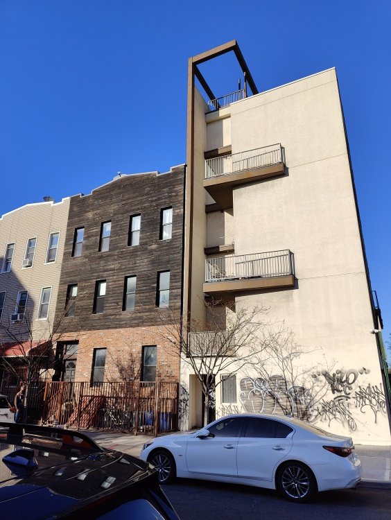 Apartment building blue sky