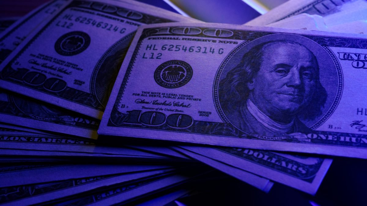 Close-up US dollars with low light