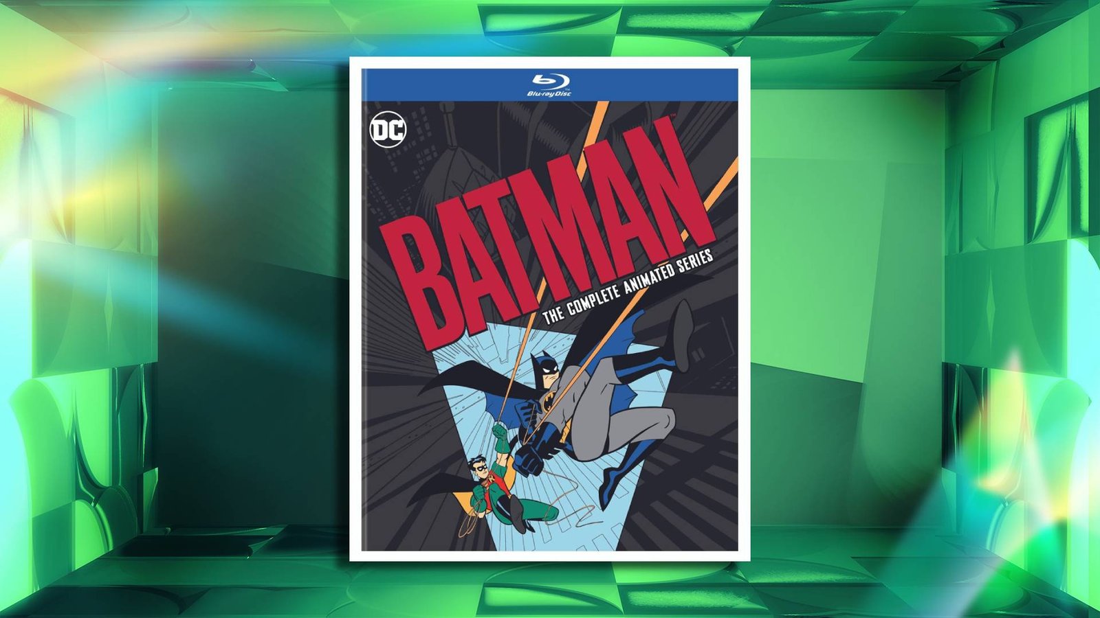 Blu-ray box set cover featuring a stylized illustration of Batman swinging across a cityscape with Robin below, bold red “Batman” title text across the top, and a DC logo in the corner, all framed against CNET background
