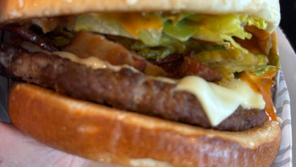 burger with two patties and various fixings