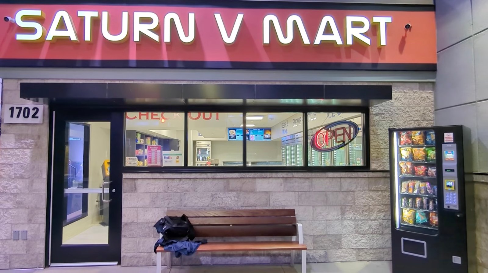 a screenshot from the FBI's Kinetic Cyber Range video, showing the FBI's model town featuring a grocery store and gas station